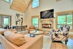 Spacious Open Concept Living Area with 70-inch Smart TV